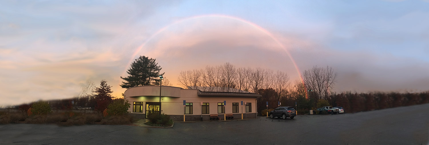 a rainbow appears above the office